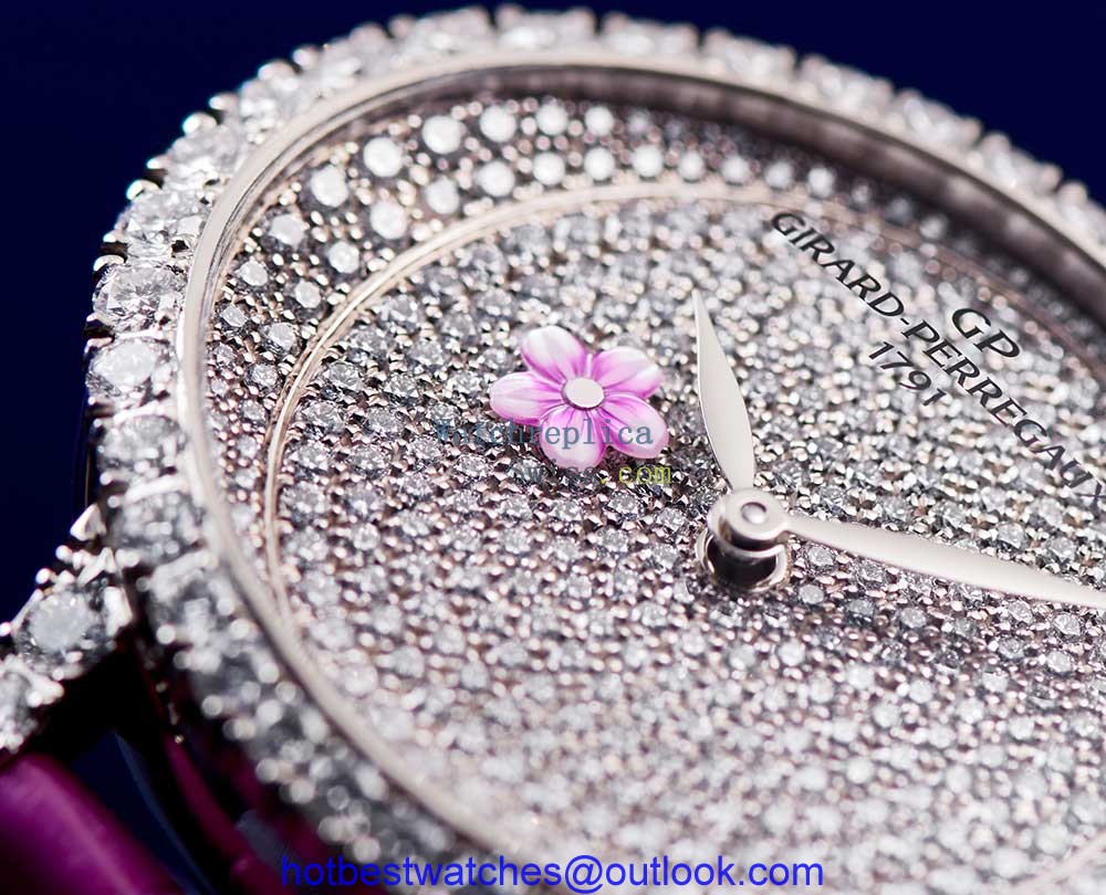 girard perregaux cat eye plum blossom closeup