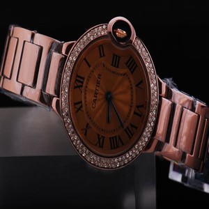Cartier Ballon Bleu de Cartier WE902034 Diamond Bezel Gold Dial Watch